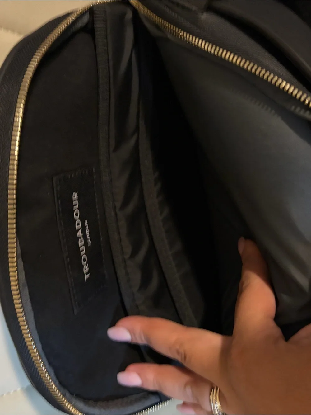 Sophisticated Black Women's Backpack with Gold Hardware